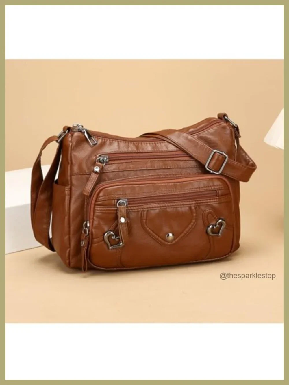 Faux Leather Tassel Crossbody Bag with Adjustable Strap and Multiple Pockets